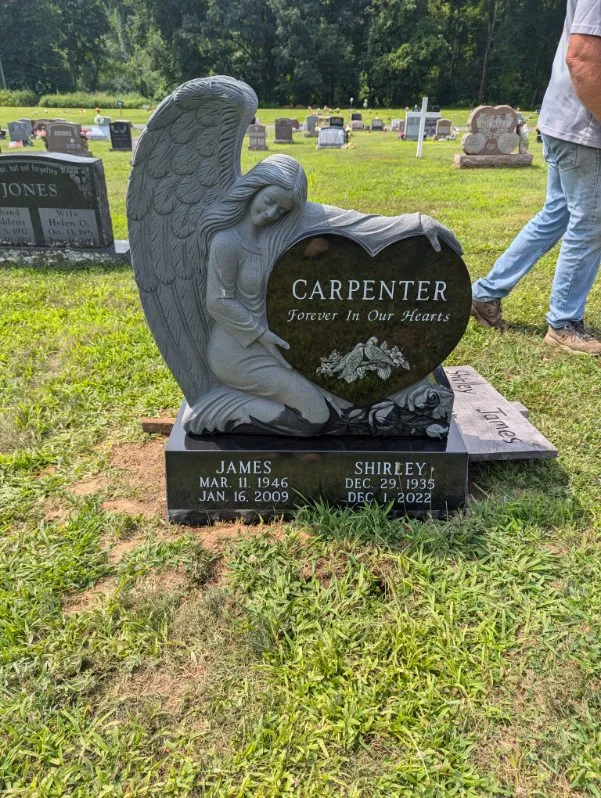 Carpenter_monument construction worker on roof